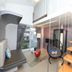 The House of Water in Dongshan Township, modern loft room with hanging chair and floating staircase