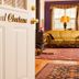 Royal Chateau room at Hearthstone Elegant Lodge by the River in Kamiah with gold sofa and purple walls