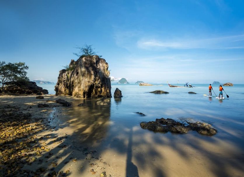 Krabi Home Resort in Ban Khlong Muang with a rocky beach and calm sea at low tide