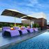 Citadines Sukhumvit 11 Bangkok rooftop pool with purple loungers and city views in Bangkok