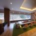 Kurobe Unazuki Onsen Yamanoha lounge with large windows and seating area in Kurobe