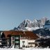 Hotel Waldfrieden in Rohrmoos with alpine mountain views and a snowy peak backdrop