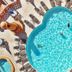 Sea of Cortez Beach Club in San Carlos with a clover-shaped outdoor pool and lounge chairs