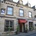 Station Hotel And Restaurant in Melrose, stone facade with restaurant entrance and street view