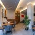 Utkubey Hotel lobby in Gaziantep with seating area, reception desk and potted plant