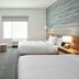 TownePlace Suites by Marriott Pigeon Forge guest room with two beds and window