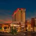 Thunder Valley Casino Resort in Lincoln at dusk, with a tall illuminated tower and resort entrance