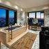 Mandarin Oriental, Tokyo suite with city skyline views, soaking tub, and marble bathroom