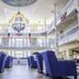 Blue Harbor Resort And Spa in Sheboygan grand lobby with chandelier and blue armchairs
