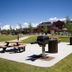 Wyndham Vacation Resorts Steamboat Springs outdoor picnic area with grill and trash bins in Steamboat Springs