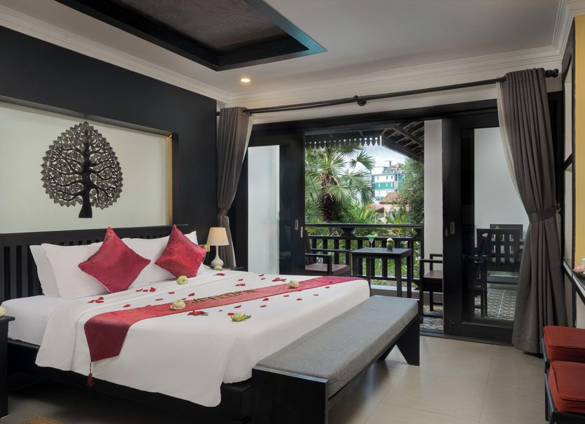 Khmer Mansion Boutique Hotel in Siem Reap room with balcony view and king bed
