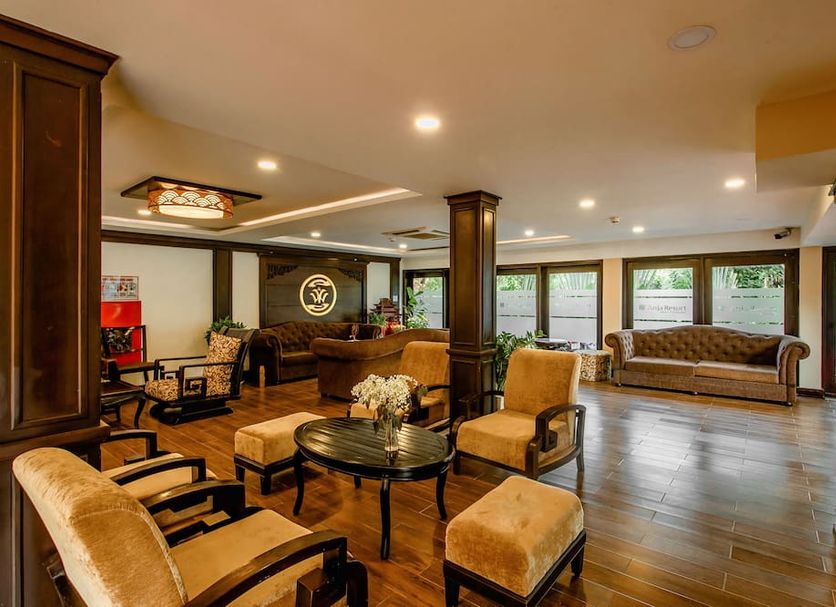 Anja Beach Resort & Spa lobby in Phu Quoc with seating area and wood floors