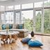 Living Hotel Prinzessin Elisabeth, Munich: bright lounge with floor-to-ceiling windows and sectional sofa