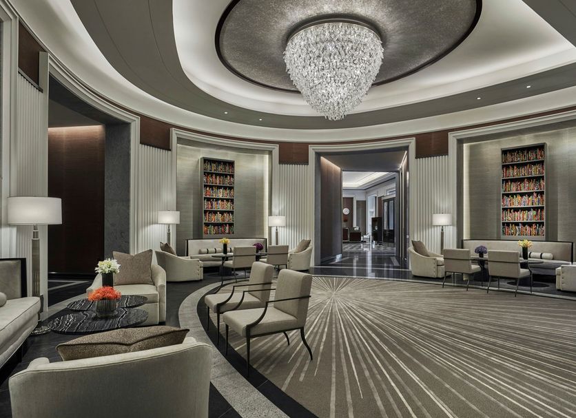 Four Seasons Hotel One Dalton Street, Boston lobby lounge with chandelier and curved seating area