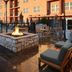 Residence Inn by Marriott Dallas Plano/The Colony fire pit patio with seating and outdoor pool view
