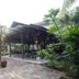 Hotel Seri Malaysia Johor Bahru courtyard with tropical plants and covered outdoor seating