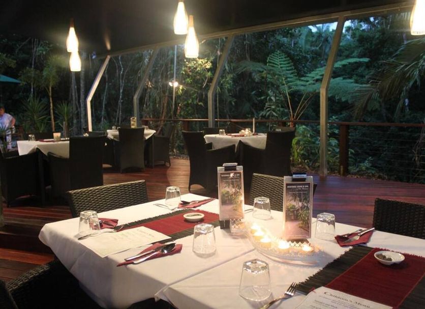 Heritage Lodge - in the Daintree outdoor dining deck in Diwan with tropical rainforest views