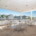 Hotel Boutique Rato 10 in Playa del Carmen outdoor terrace with tables, chairs and ocean view