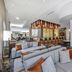 Embassy Suites by Hilton Raleigh Durham Airport Brier Creek lobby with bar seating and lounge area in Raleigh