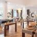 Hotel Cala Caterina in Villasimius breakfast room with buffet tables, orchids, and arched windows