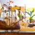 Hotel Principe Bibione lobby with large decorative sailing ship model and seating area