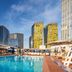 The Reserve at Park MGM in Las Vegas with a resort pool and city skyline views