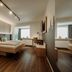 Hotel Waldfrieden in Rohrmoos guest room with floating bed, wood floors, desk, and window seating