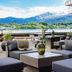 Quality Hotel Waterfront Alesund terrace seating with mountain and waterfront views in Ålesund