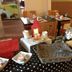 Residence Les Thermes in Luxeuil-les-Bains breakfast buffet with pastries, tea, and dining tables