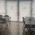 Hotel Dorado Ferial Bogotá meeting room with folding tables and chairs by large windows