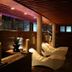 Reserva del Saja Hotel & Spa spa lounge with chaise loungers and warm wood interior in Renedo de Cabuérniga