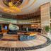 DoubleTree by Hilton Guangzhou - Science City lobby with circular seating and modern chandelier in Guangzhou
