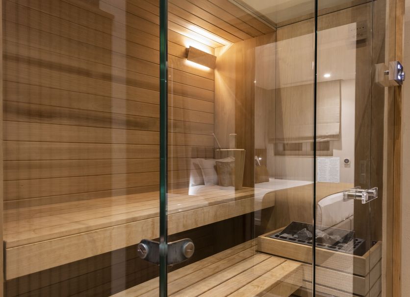 The Duke Boutique Hotel in Victoria sauna with wood benches and glass door