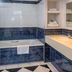 Best Western Heath Court Hotel Newmarket bathroom with double sink vanity and bathtub