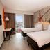 ibis Styles Lima Benavides Miraflores twin room with city-view window and mural wall in Lima