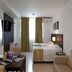 Intercity João Pessoa guest room with twin beds, desk, TV and sofa in João Pessoa