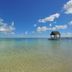 Trou Aux Biches Beachcomber Golf Resort & Spa in Trou Aux Biches with kayak on clear tropical sea and pier