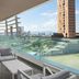 Four Points by Sheraton Izmir balcony with lounge chairs and city skyline views over Izmir