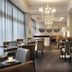AC Hotels by Marriott Ambassadeur Antibes- Juan les Pins dining room in Antibes with chandeliers and tables