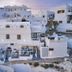 Santorini Mansion at Imerovigli in Imerovigli, white cliffside hotel with terraces and sea-view seating