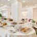 Europa Stabia Hotel in Castellammare di Stabia breakfast buffet with pastries and bread on a white table