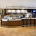 Courtyard by Marriott Cleveland Beachwood lobby bar with curved counter and seating
