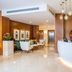 Staybridge Suites Cairo - Citystars By IHG lobby with curved reception desk and seating area