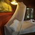 Baia Baia Resort in Ko Phi Phi bedroom with canopy bed and mosquito net in a wooden bungalow
