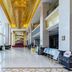Liuhu Hotel (Hot Spring Garden Hotel) lobby in Dezhou with high ceilings and gold-accented decor