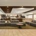 Courtyard by Marriott Fort Myers Cape Coral lobby with bar seating and modern lounge area