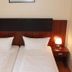 City Hotel Mercator in Frankfurt am Main twin room with two single beds and bedside lamps