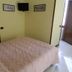 Albergo Michieletto in Montano Lucino guest room with twin beds and wall-mounted TV