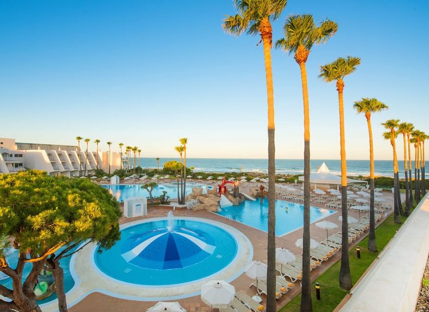 Iberostar Waves Royal Andalus in Chiclana de la Frontera with pools, palm trees and ocean view