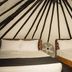 Hotel Maya del Mar in Playa del Carmen: rustic room with two beds and a small fan